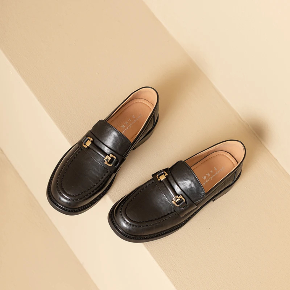 The Montepulciano Men’s Classic Slip On Leather Loafers with Metal Buckle
